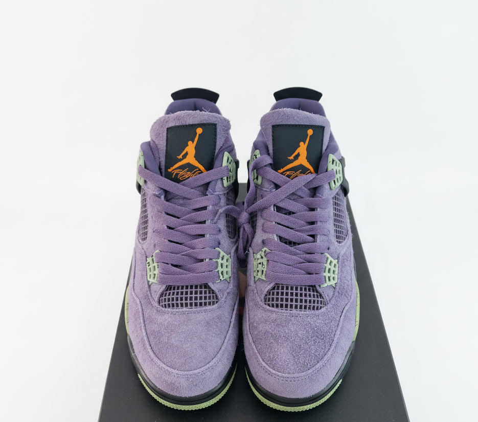 Air JORDAN 4 RETRO CANYON PURPLE...
