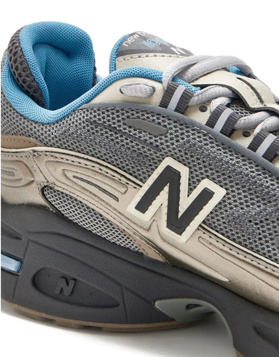 New Balance
1000 metallic-mesh sneakers